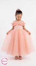 Young girl wearing a pink dress on a white background